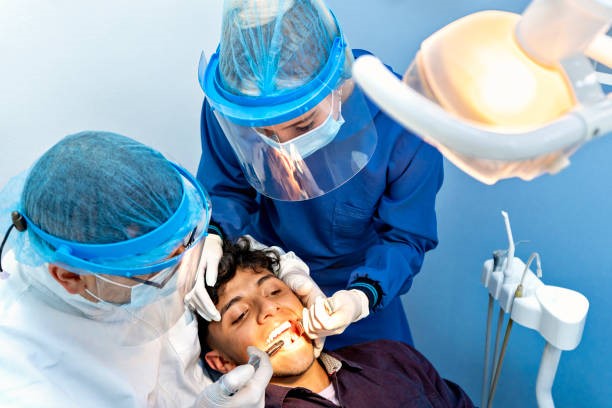 The surgical removal of the operculum, or the flap of gum that partially conceals a tooth